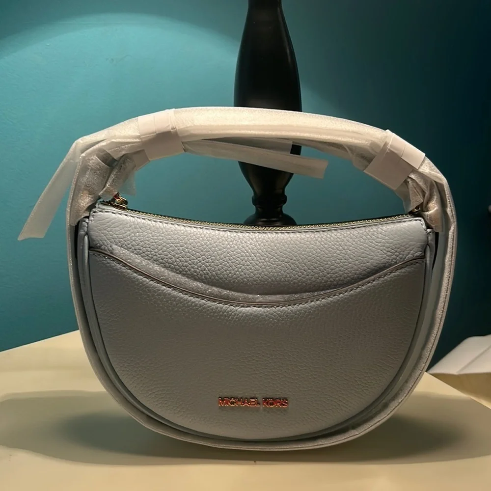 Michael Kors sky blue half moon shoulder bag